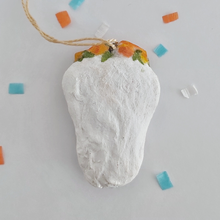 Load image into Gallery viewer, A back view of a spun cotton sugar skull ornament, on a white background. Pic 5 of 5.