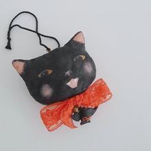 Load image into Gallery viewer, Another close-up of a vintage style, spun cotton black cat against a white background. Pic 7 of 7.