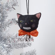 Load image into Gallery viewer, A vintage style, spun cotton black cat ornament hanging from a silver tree against a white background. Pic 1 of 6.