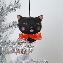 Load image into Gallery viewer, A vintage style spun cotton black cat ornament hanging from a tree, against a white background. Pic 1 of 7.