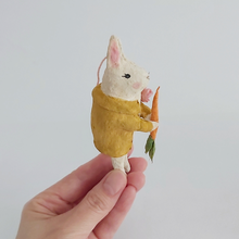 Load image into Gallery viewer, Another side view of a vintage style, spun cotton bunny ornament . It's held in hand against a white background. Pic 6 of 12.