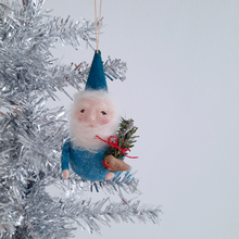 Load image into Gallery viewer, Decorative Christmas ornament of a gnome with a blue hat and outfit, hanging on a silver tinsel tree.
