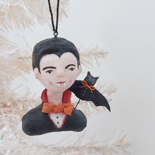 Load image into Gallery viewer, Vintage style spun cotton dracula ornament hanging from a tree. Pic 3 of 8.