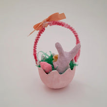 Load image into Gallery viewer, The back view of a decorative Easter basket with pink egg, bunny, and bow on a light background