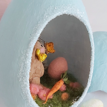 Load image into Gallery viewer, A close-up photo of a spun cotton butterfly sitting on a spun cotton bunny's nose in a vintage style diorama ornament.