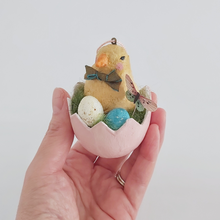 Load image into Gallery viewer, A vintage style spun cotton Easter chick egg ornament being held in a hand against a white background. Pic 4 of 7.