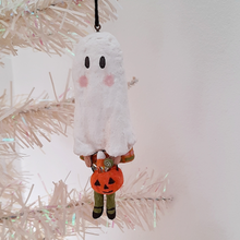 Cargar imagen en el visor de la galería, A vintage style, spun cotton ghost girl ornament hanging from a tree. Pic 3 of 8.
