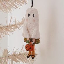Load image into Gallery viewer, A vintage style, spun cotton ghost girl ornament hanging from a tree. Pic 4 of 7.