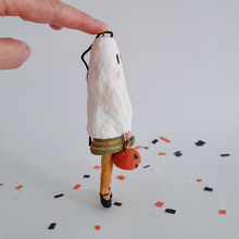 Load image into Gallery viewer, An opposite side view of a vintage style, spun cotton ghost girl ornament on Halloween confetti against a white background. Pic 7 of 7.