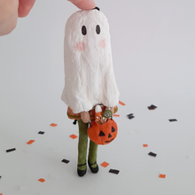 Cargar imagen en el visor de la galería, A vintage style, spun cotton ghost girl ornament standing on Halloween confetti against a white background. Pic 1 of 8