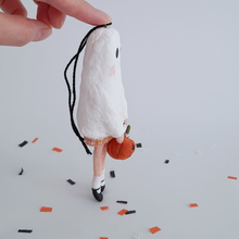 Load image into Gallery viewer, Another side view of a vintage style, spun cotton ghost girl ornament on Halloween confetti against a white background. Pic 8 of 8.