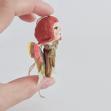 Load image into Gallery viewer, Side view of vintage style spun cotton ginger butterfly girl ornament. Pic 5 of 7.
