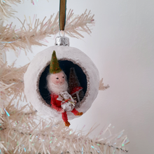 Load image into Gallery viewer, A vintage style, spun cotton gnome diorama ornament hanging from a white Christmas tree. Pic 4 of 5.
