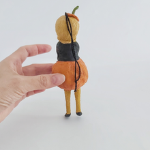 Load image into Gallery viewer, Back view of vintage style spun cotton pumpkin girl ornament. Pic 6 of 9.