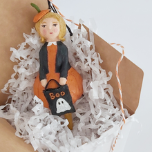 Load image into Gallery viewer, Vintage style spun cotton pumpkin girl ornament laying in a white gift box on white tissue shredding. Pic 8 of 9.