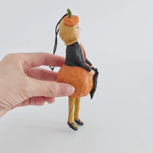 Load image into Gallery viewer, Opposite side view of vintage style spun cotton pumpkin girl ornament. Pic 7 of 9.