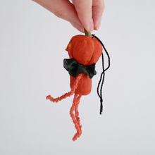 Load image into Gallery viewer, A side view of a vintage style, spun cotton pumpkin man ornament against a white background. Pic 5 of 8.