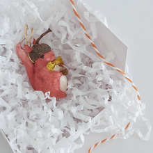 Cargar imagen en el visor de la galería, A vintage style spun cotton red squirrel laying in a white gift box, surrounded by white tissue shredding and orange and white baker's twine. Pic 9 of 9.