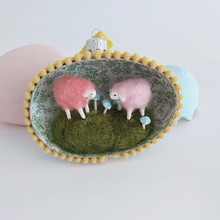 Load image into Gallery viewer, A vintage style spun cotton sheep diorama egg ornament laying against pink and baby blue egg ornaments. Pic 1 of 6.