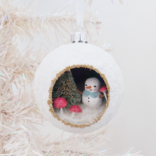 Load image into Gallery viewer, A vintage style spun cotton snowman diorama ornament hanging on a white Christmas tree. Pic 2 of 6.