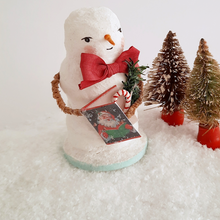 Load image into Gallery viewer, Another view of a vintage style, spun cotton snowman standing next to two vintage bottlebrush trees. Pic 6 of 6.