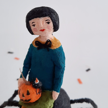 Load image into Gallery viewer, A close-up of the face of a spun cotton girl sitting on a spun cotton spider. Pic 3 of 10.