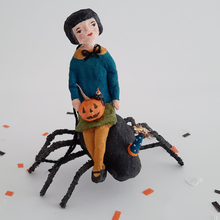 Load image into Gallery viewer, A photo of a vintage style, spun cotton girl sitting on a spun cotton spider against a white background on Halloween confetti. Pic 4 of 10.