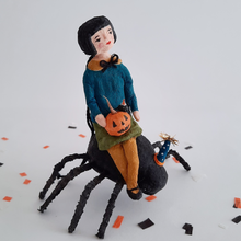 Load image into Gallery viewer, Another view of a vintage style, spun cotton girl sitting on the back of a spun cotton spider against a white background. Pic 7 of 10.