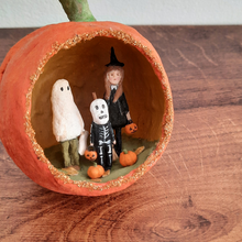 Load image into Gallery viewer, A vintage style, spun cotton trick-or-treaters ornament sitting on a wood background. Pic 5 of 7.