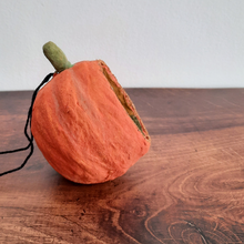 Load image into Gallery viewer, A side view of a vintage style, spun cotton trick-or-treaters ornament sitting on a wood background. Pic 6 of 7.