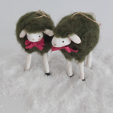 Load image into Gallery viewer, A close-up of two vintage style woolly, spun cotton green sheep ornaments. Pic 4 of 7. 
