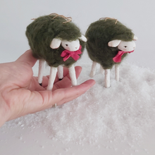 Cargar imagen en el visor de la galería, Vintage style woolly spun cotton green sheep, held in hand against a white background. Pic 2 of 7.
