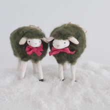 Load image into Gallery viewer, A front facing photo of two vintage style, woolly spun cotton green sheep ornaments against a white background. Pic 7 of 7. 
