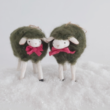 Cargar imagen en el visor de la galería, A front facing photo of two vintage style, woolly spun cotton green sheep ornaments against a white background. Pic 7 of 7.