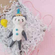 Load image into Gallery viewer, Spun cotton panda lying in a box with white shredded paper, bakers twine to the side. Picture 7