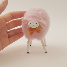 Load image into Gallery viewer, Hand next to sheep, for size comparison. Pic 3 of 8.