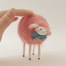Load image into Gallery viewer, Hand next to sheep, as size comparison. Pic 6 of 6.
