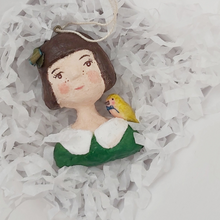 Load image into Gallery viewer, Spun cotton girl ornament, laying in white gift box with shredded tissue paper. Pic 11 of 11.