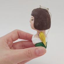 Load image into Gallery viewer, Side view of spun cotton girl ornament. Pic 7 of 11.