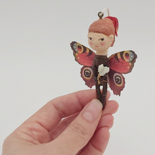 Load image into Gallery viewer, Another view of spun cotton butterfly girl, held in hand. Pic 3 of 7.