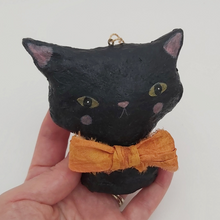 Cargar imagen en el visor de la galería, Spun cotton cat ornament, held in hand. Pic 2 of 6.