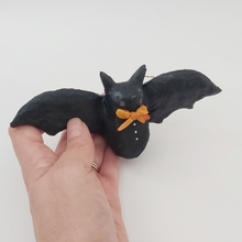 Cargar imagen en el visor de la galería, Spun cotton bat ornament, held in hand. Pic 4 of 8.