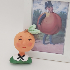 Spun cotton peach girl sitting next to Victorian anthropomorphic peach man illustration. Pic 9 of 9.