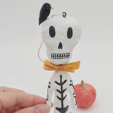 Cargar imagen en el visor de la galería, Close up of spun cotton bird and skeleton's face. Pic 1 of 4.