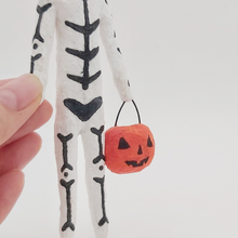 Load image into Gallery viewer, Close up of spun cotton jack-o-lantern bucket. Pic 4 of 5.