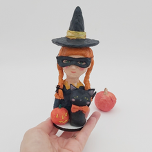 Cargar imagen en el visor de la galería, Spun cotton girl witch sculpture, held in hand for size comparison. Pic 4 of 6.