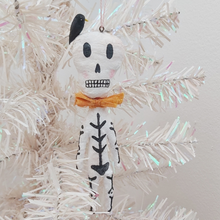 Cargar imagen en el visor de la galería, Spun cotton skeleton ornament hanging from tree. Pic 2 of 4.