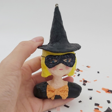 Load image into Gallery viewer, Spun cotton witch girl ornament, held in hand. Pic 2 of 6.