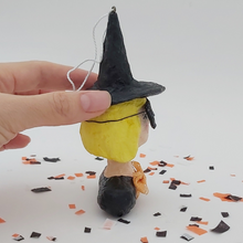 Load image into Gallery viewer, Side view of spun cotton witch ornament. Pic 5 of 6.