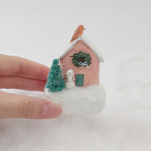 Load image into Gallery viewer, Spun Cotton Pink House, held in hand for size comparison. Pic 2 of 7.